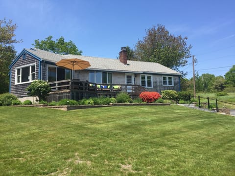 Enjoy out door dining, our lovely perennial gardens &  views of Little River