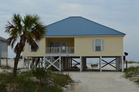 front of house, gulf seen out back