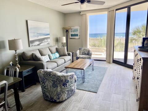 Living area with ocean view! New furniture (5/20)  and flooring throughout! 