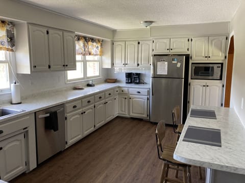 Fully equipped kitchen and bar seating