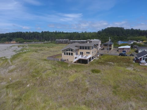 Aerial view of house. Right at end of lane