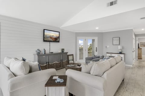 Living Room With Sofa Sleeper.  Unit will sleep a maximum of six people