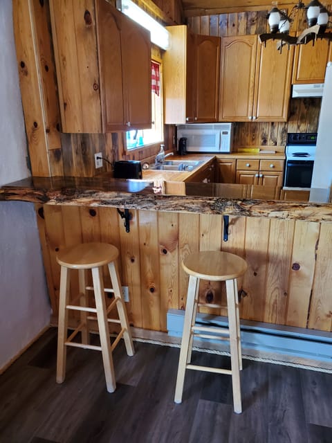 New bar and window looking into the kitchen.