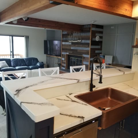 Kitchen open to living and dining areas