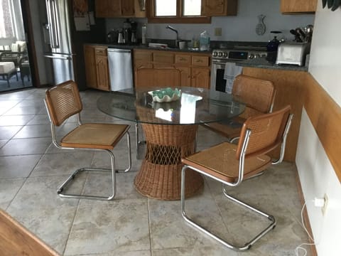 Spacious 12'x18' gourmet kitchen with blue-eye granite, updated appliances.