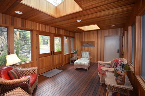 'Cedar Pass' has storm widows during the winter & is screened in during summer.