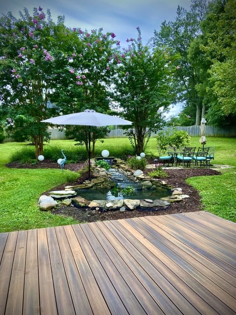 Koi pond, babbling brook and outdoor dining area.
