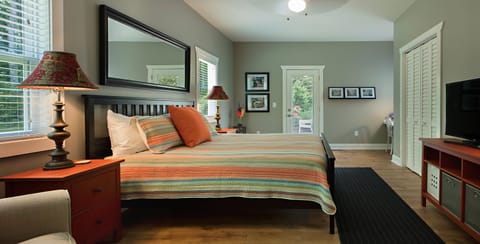 Down stairs bed room #2
King Bed with private patio