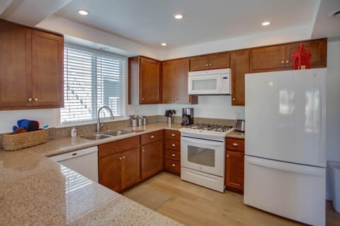 Kitchen is fully-stocked with dishes, cooking, baking and meal prep gear. All standard large and small appliances included. See listing description.