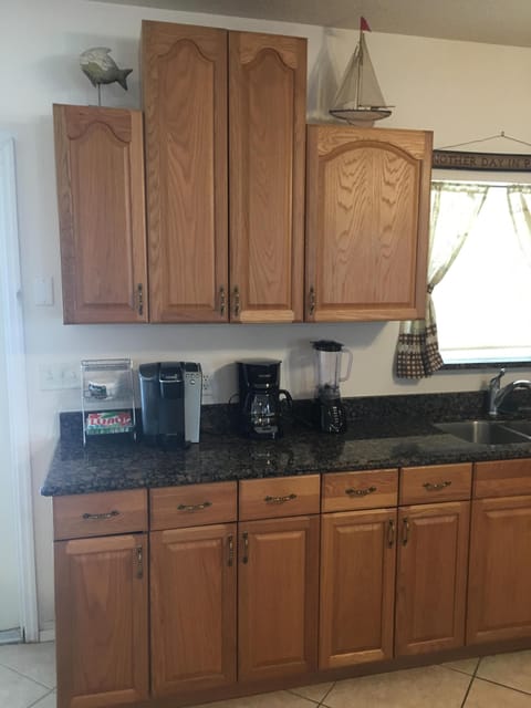Kitchen 
showing both coffee makers a 12 cup and a Keurig and a blender