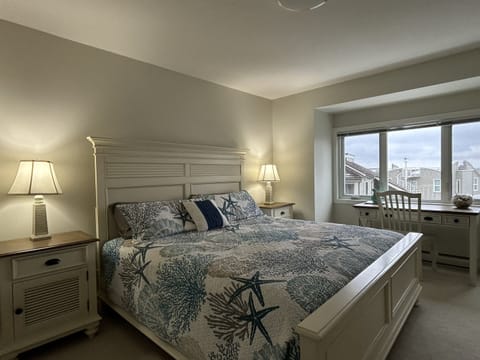 Primary king bedroom with private deck