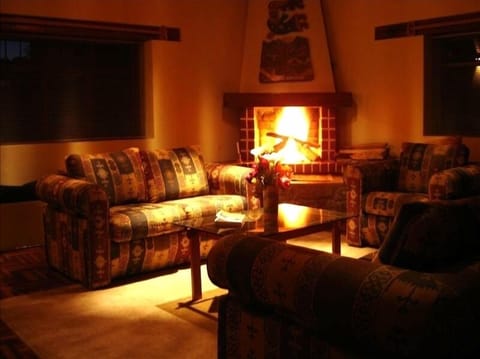 Living room with fireplace and hardwood floors