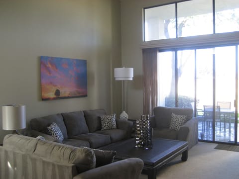 Comfortable, large, open living room includes 50' flat screen