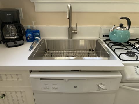 Example of space saving - A compact dishwasher under the sink