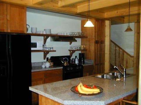 The kitchen is designed for groups to cook together