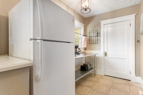 Stainless Steel table for easy storage of your food and vacation supplies.