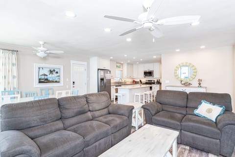 The main living, dining, and kitchen area open up to each other for easy, social gatherings.