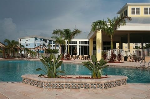 Spacious pool and plenty of places to lounge by the pool.