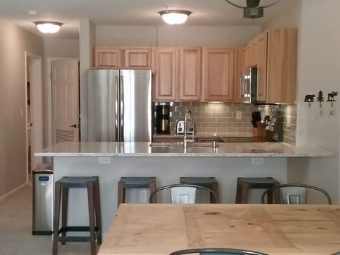 Seating for 4 at the island, plus 4 at the table