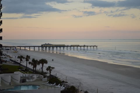 View from balcony looking towards Crabby Joe's Sundeck Pier; GREAT FOOD!