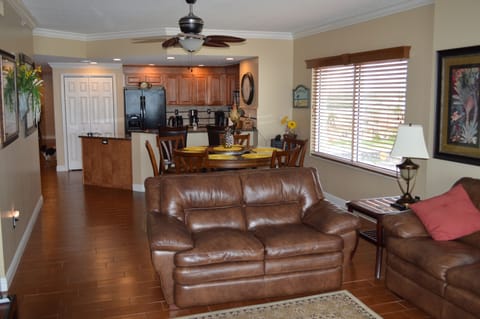 New leather furniture includes full-size couch, loveseat & chair w/ottoman