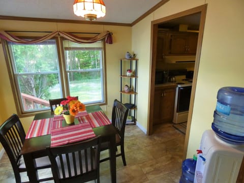 Breakfast nook has extra dining seating and a hot/cold water cooler.
