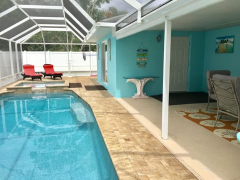 Plenty of relaxing screened in outdoor living space. 