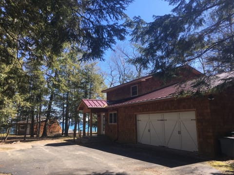 Exterior front of house from driveway facing the bay