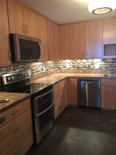 Kitchen has plenty of counter space, dishwasher, double oven & 2 refrigerators