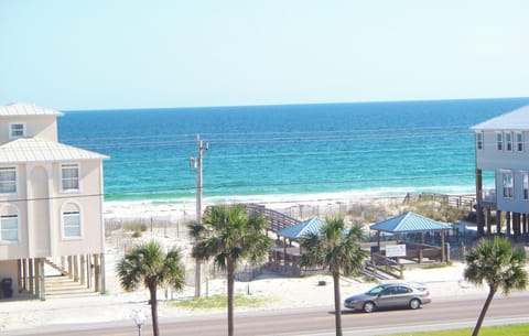 View from balcony of deeded beach access and pavilions