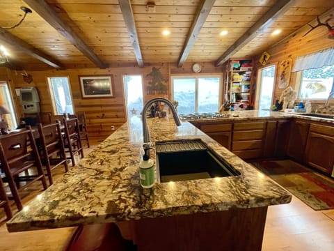 Bar Sink,  Game Shelf, Access To Back Deck And Hot Tub