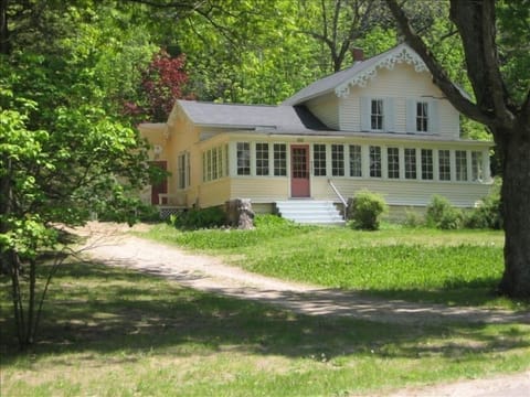 Circular pull through driveway, an acre of land, across the road from Glen Lake