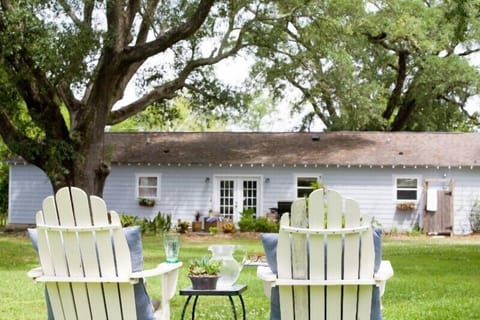Oak trees provide lush canopy in large backyard