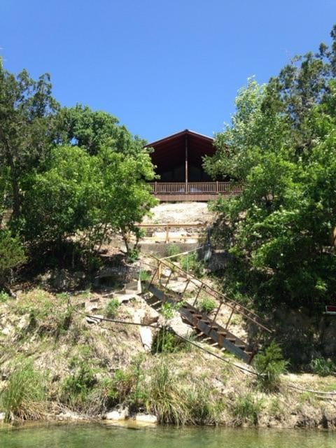 Picture of Howdy's from the river...just look at that deck and view it provides!