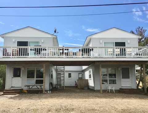 Huge deck to enjoy the sunset! House is a duplex. (Upstairs/Downstairs)