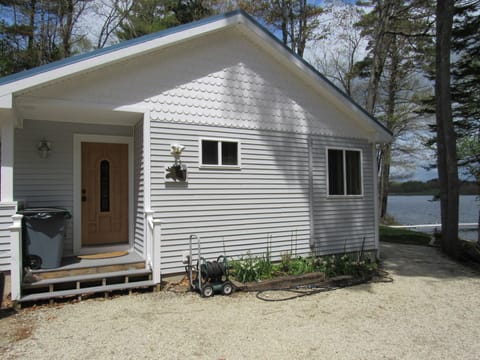 Front of cottage, Lake is in the rear, flat and level to the lake, 40'  away