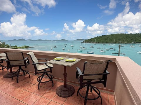 Your front deck includes two dining areas.  A perfect spot to enjoy your morning coffee as the island comes alive