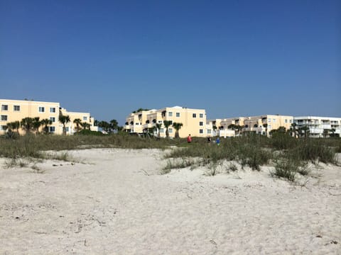 View from ocean beach looking back at condominium.