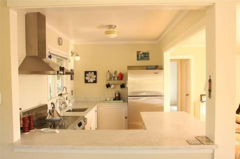 Kitchen with view of doorway to bonus room.