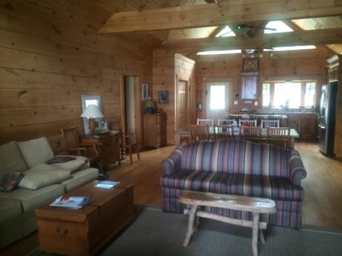 View of great-room: shows seating area, dining area and kitchen.
