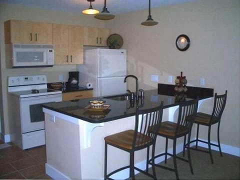 Full Kitchen with Dishes and Pans