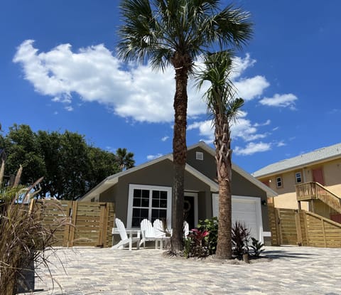 Relax With Loved Ones As You Enjoy Florida's Endless Summers Right At The Beach!