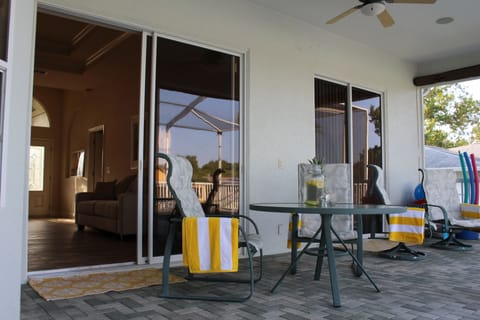 Shaded lanai, with acess to living room, family room, and master suite.