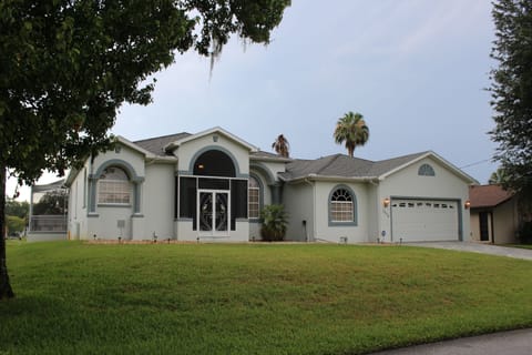 Lots of light, a huge garage, and a great dock with boat lift in the back.