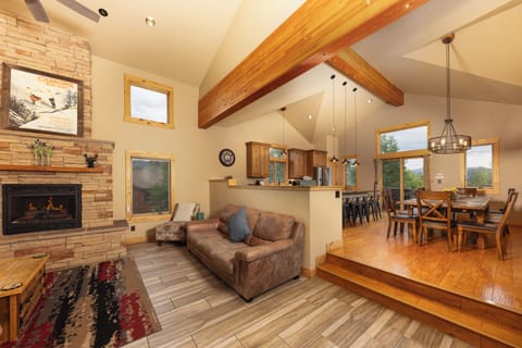 main living room adjacent to large kitchen/dining area