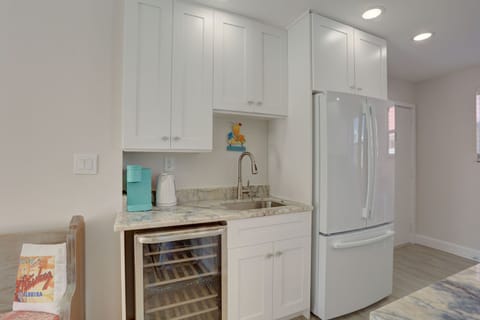 Brand new wet bar and dual zone wine refrigerator. 