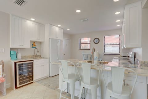 Newly renovated with all new appliances, flooring, cabinetry and quartzite!