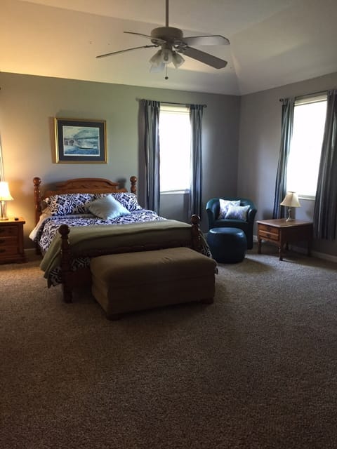 Master bedroom with queen size bed and 32" television and en suite master bath.