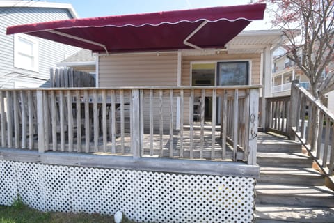 Large deck with teak table, chairs.  Retractable awning for shade or sun!