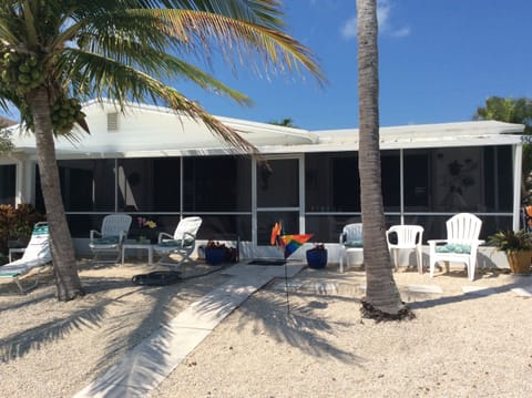 View of the canal side of the unit showing full porch